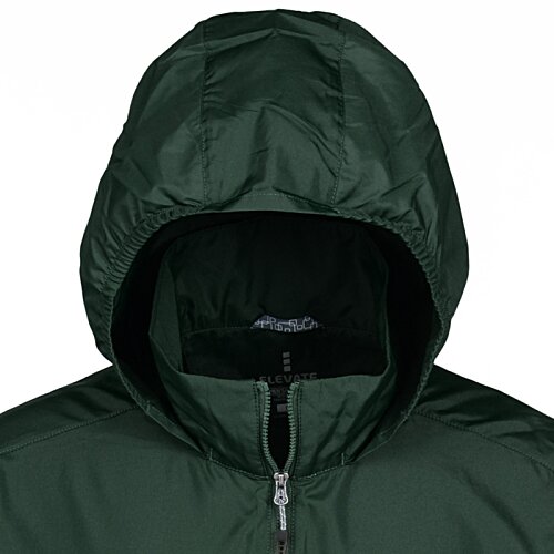 Additional Image 2 - a person wearing a green jacket