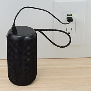 Additional Image 2 - a black device with a cord plugged into a wall outlet