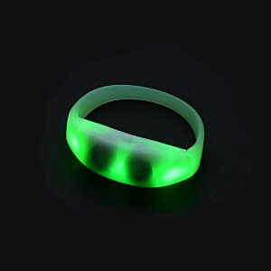 Additional Image 5 - a green bracelet on a black surface