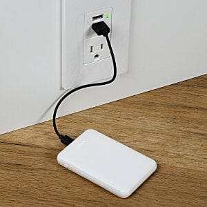 Additional Image 5 - a white rectangular object with a black cord plugged into a wall outlet