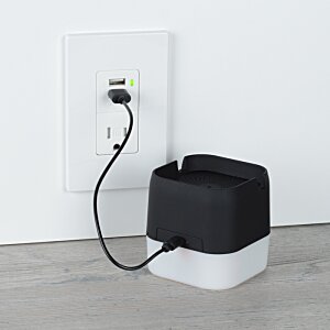 Additional Image 5 - a black and white cube with a cord plugged into a wall