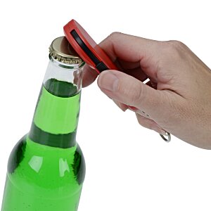 Additional Image 4 - a hand opening a bottle of green liquid