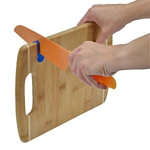 Additional Image 2 - a person holding a cutting board