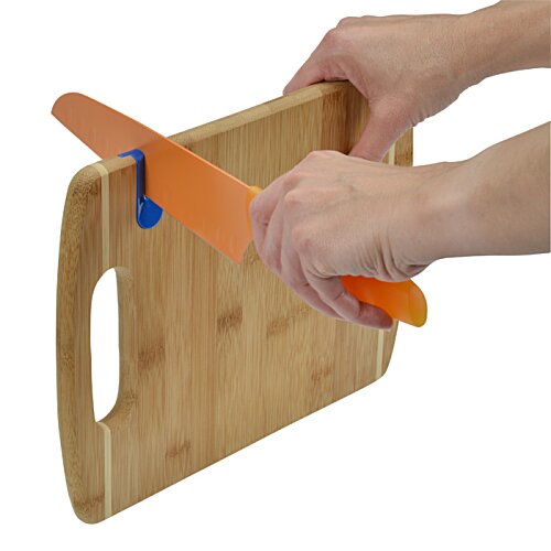 Additional Image 2 - a person holding a cutting board