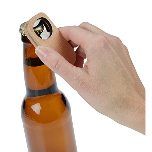 Additional Image 1 - a hand holding a bottle opener
