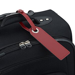 Additional Image 3 - a red tag on a black suitcase