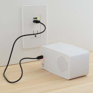 Additional Image 5 - a white rectangular object with a black cord plugged into a wall