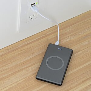 Additional Image 4 - a phone charging on a table