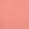 a pink fabric with a white spot