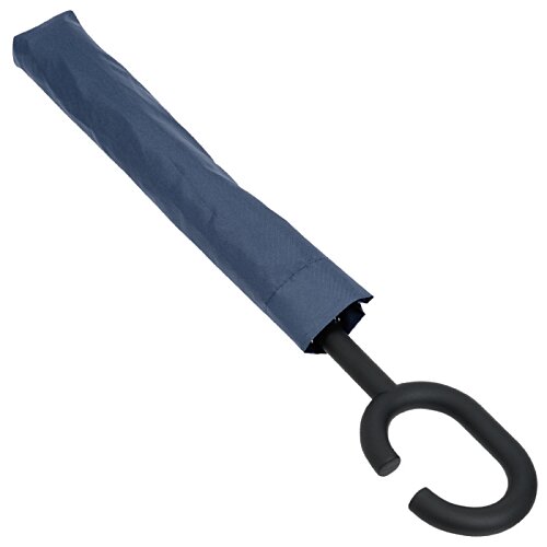 Additional Image 3 - a blue handle with a black handle