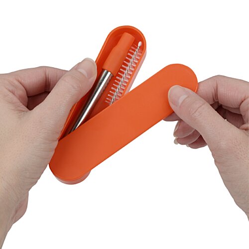 Additional Image 2 - a person holding an orange box with a metal needle