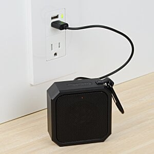 Additional Image 4 - a black square object with a cord plugged into a wall