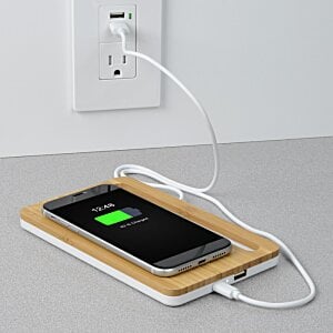 Additional Image 3 - a phone charging on a table