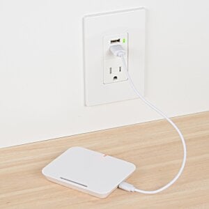 Additional Image 2 - a white rectangular object with a cord plugged into a wall outlet