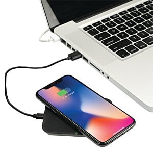 Additional Image 7 - a cell phone charging on a wireless charger