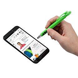 a hand holding a green pen