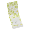 a small package with a flower design