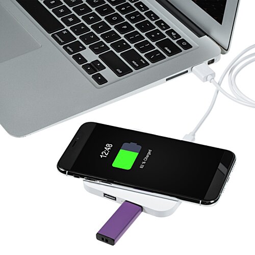 Additional Image 4 - a cell phone charging on a charging station