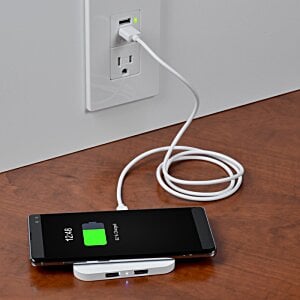 Additional Image 2 - a cell phone charging on a table