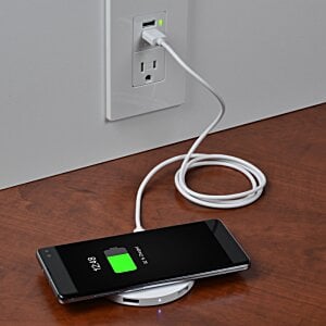 Additional Image 2 - a cell phone charging on a wireless charger