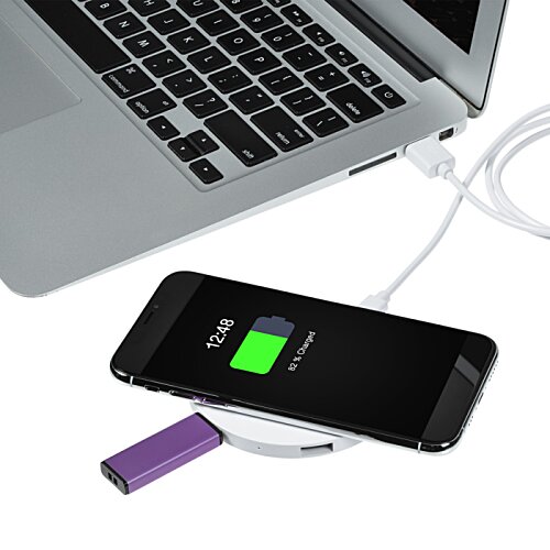 Additional Image 4 - a cellphone charging on a laptop