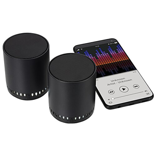 Additional Image 3 - a black cylinder and a remote control