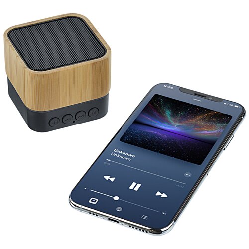 Additional Image 6 - a blue cell phone and a brown cube