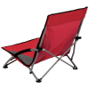 a red folding chair with black legs