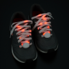 Additional Image 3 - a pair of black shoes with red lights