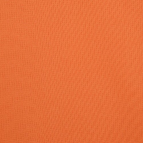 Additional Image 2 - a orange surface with a black spot