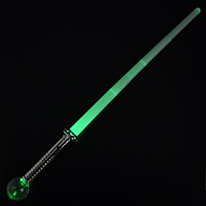 Additional Image 2 - a green light saber on a black background