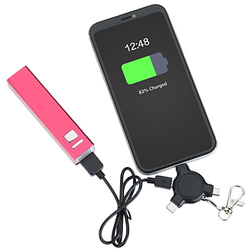 Additional Image 1 - a black rectangular object with a green rectangle on it next to a pink object