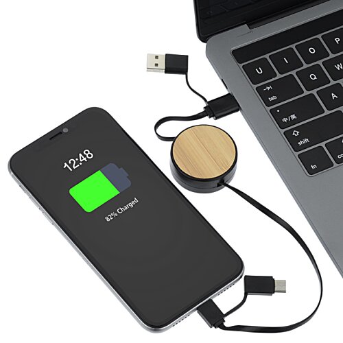 Additional Image 3 - a black device with a green screen next to a laptop