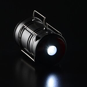 Additional Image 8 - a black cylinder with a light