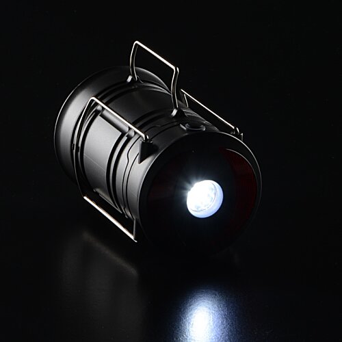 Additional Image 8 - a black cylinder with a light