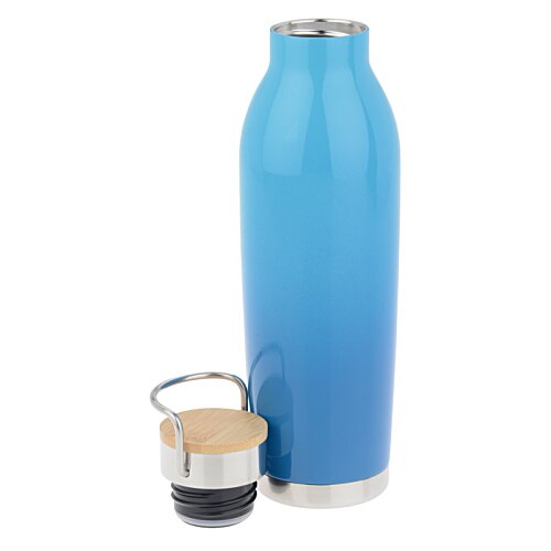 Additional Image 1 - a blue bottle next to a small bucket