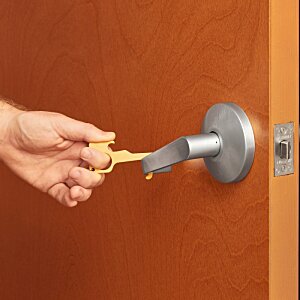 Additional Image 3 - a person opening a door