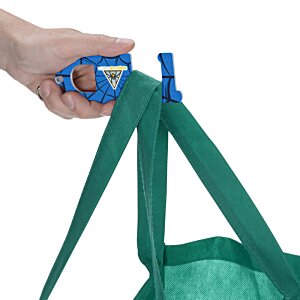 Additional Image 1 - a hand holding a blue object