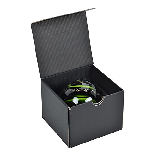 Additional Image 1 - a black box with a green object inside