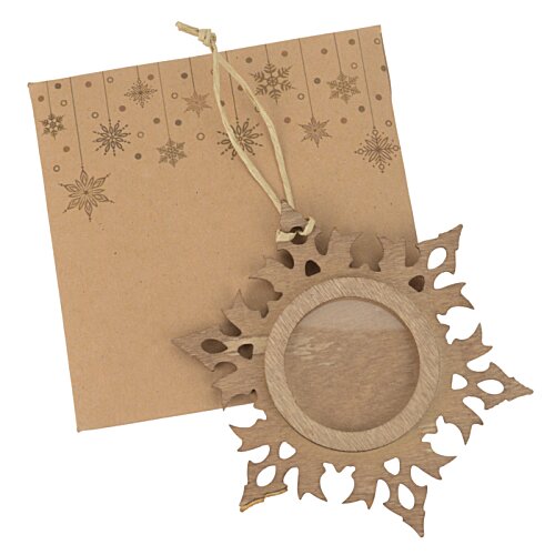 Additional Image 1 - a snowflake shaped object on a string