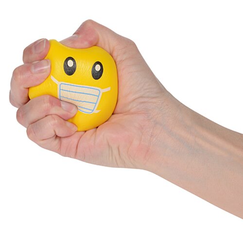 Additional Image 1 - a hand holding a yellow stress ball