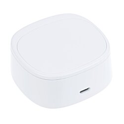 a white square object with a black button