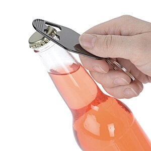 Additional Image 2 - a hand holding a bottle of liquid