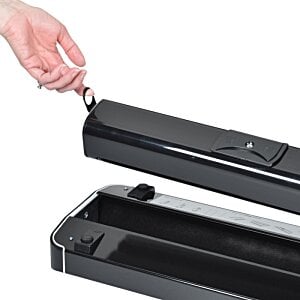 Additional Image 4 - a hand holding a black object