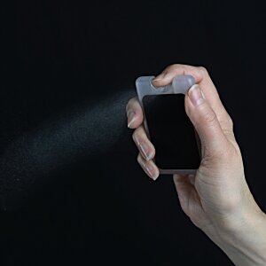 Additional Image 2 - a hand holding a black device