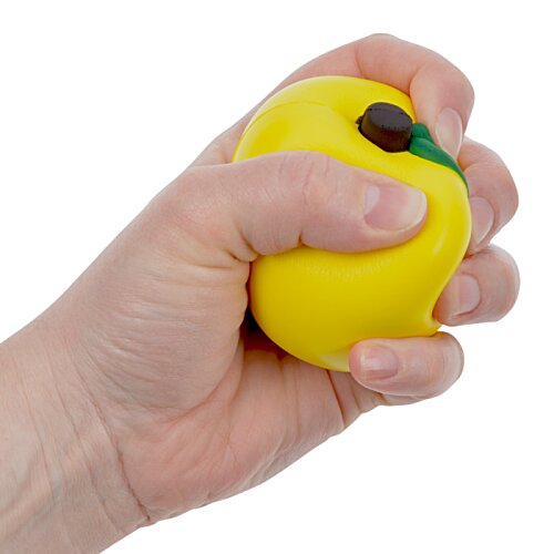 Additional Image 1 - a hand holding a yellow ball
