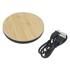 Additional Image 1 - a round wooden plate with a black cord
