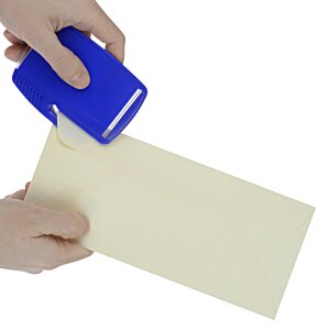 Additional Image 4 - a person using a blue container to seal a piece of paper