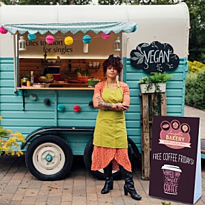 Additional Image 3 - a woman standing in front of a food truck