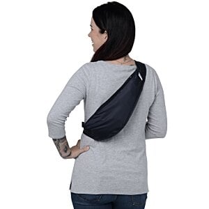 Additional Image 3 - a woman wearing a black sling bag